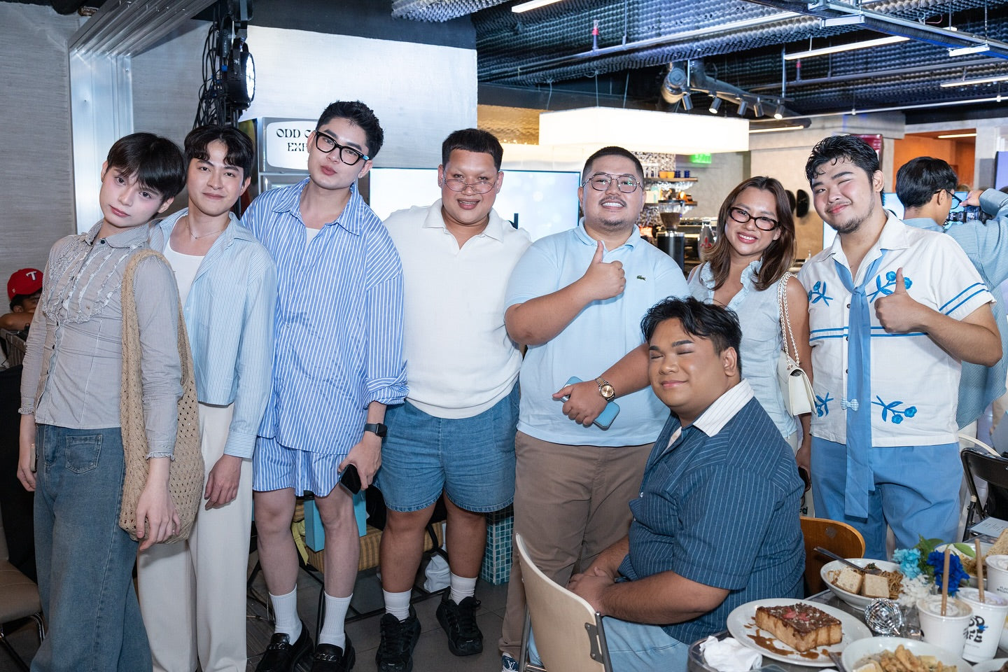 Group of people posing together in a casual setting