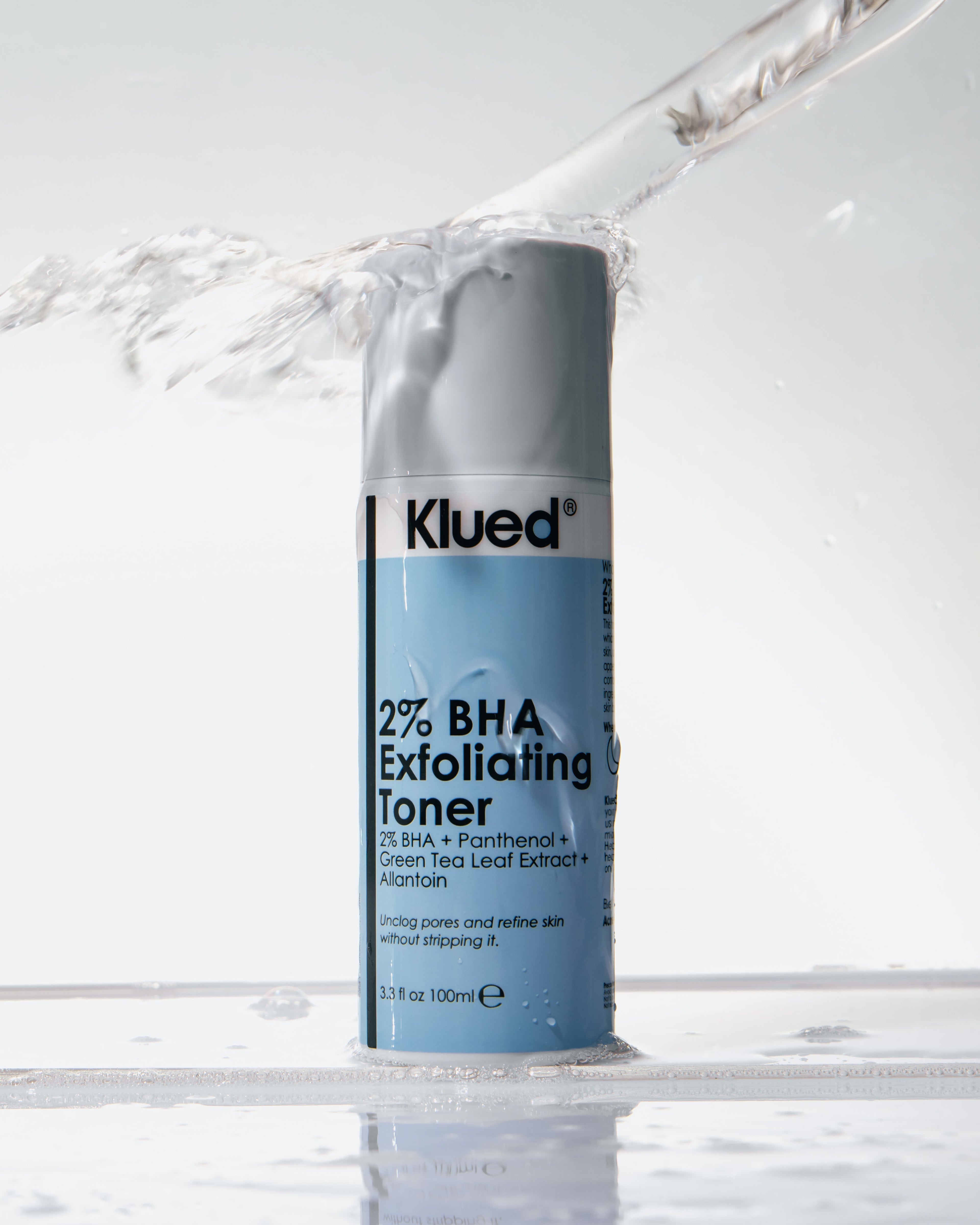 @% BHA Exfoliating Toner splashing water in white background