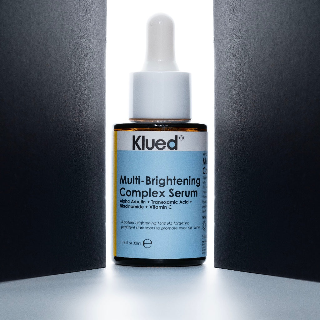 Klued Multi-Brightening Complex Serum bottle on a dark background