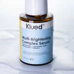 Klued Multi-Brightening Complex Serum bottle on a white background