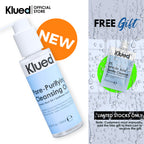 Klued Pore-Purifying Cleansing Oil with a free sample on a water droplet background